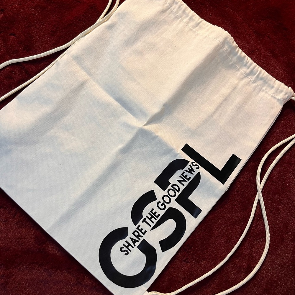 White Drawstring Bag with Black Text